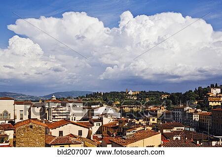Stock Photo - Cumulus Clouds above Florence Skyline. Fotosearch