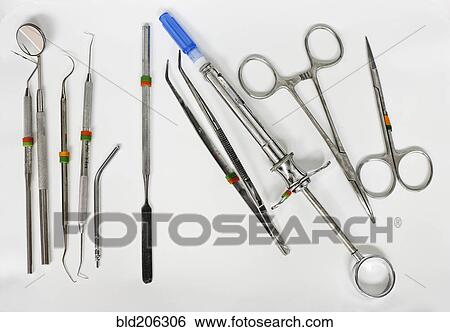 Dental Instruments on White Surface View Large Photo Image Stock Photograph - Dental Instruments on White Surface. Fotosearch