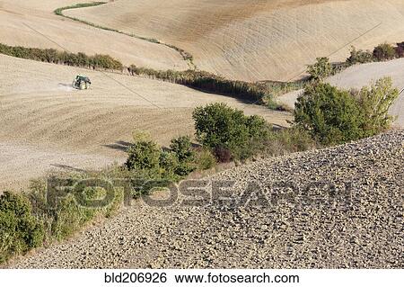 Stock Photograph - Desolate, Plowed Landscape. Fotosearch