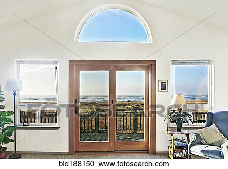 Double doors of modern house on beach View Large Photo Image Stock Image - Double doors of modern house on beach. Fotosearch