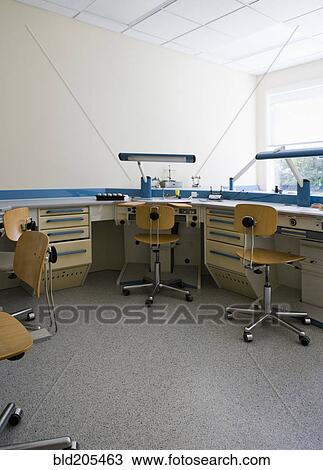 Stock Image - Empty work tables. Fotosearch