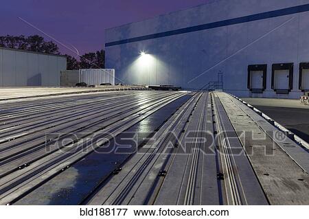 Flat bed truck trailers in parking lot View Large Photo Image Stock Photo - Flat bed truck trailers in parking lot. Fotosearch