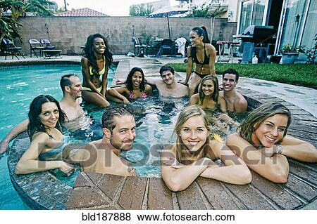 Friends relaxing in hot tub View Large Photo Image Stock Photo - Friends relaxing in hot tub. Fotosearch