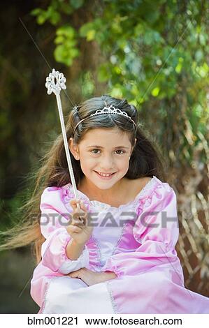 Stock Image - Girl wearing princess costume. Fotosearch