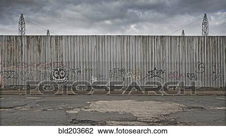 Stock Image - Graffiti on urban metal wall. Fotosearch