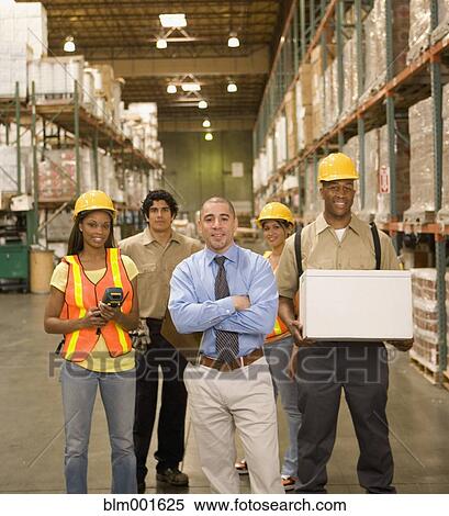Stock Photography - Group of warehouse workers. Fotosearch