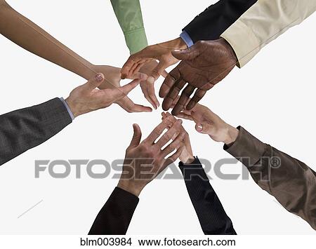 Hands of business people reaching View Large Photo Image Picture - Hands of business people reaching. Fotosearch