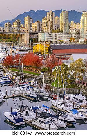 High angle view of boats docked in Vancouver harbor, British Columbia, Canada View Large Photo Image Stock Photo - High angle view of boats docked in Vancouver harbor, British Columbia, Canada. Fotosearch