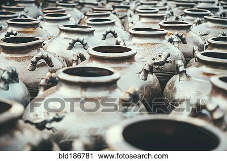 Stock Image - High angle view of empty pots. Fotosearch