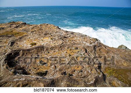 Picture - High angle view of rocky beach and ocean. Fotosearch