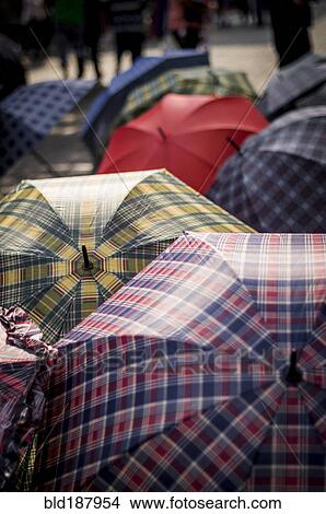 Picture - High angle view of variety of umbrellas. Fotosearch
