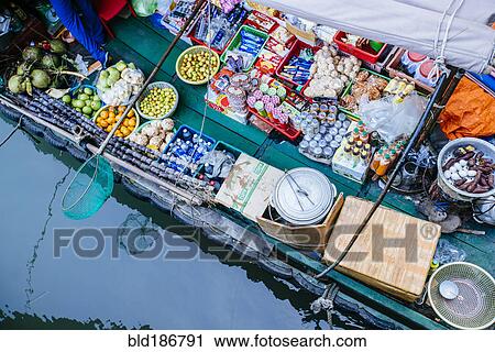 Stock Image - High angle view of vendor boat on river. Fotosearch