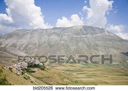 Hilltop Town With Mountain in Background View Large Photo Image Stock Photograph - Hilltop Town With Mountain in Background. Fotosearch