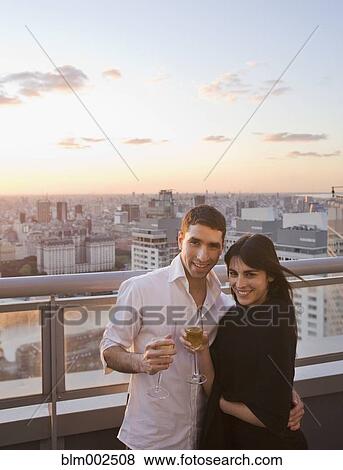 Stock Photo - Hispanic couple drinking champagne. Fotosearch