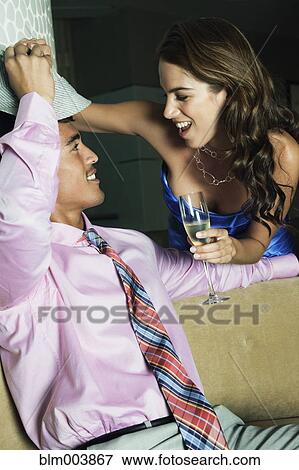 Hispanic couple flirting View Large Photo Image Stock Photo - Hispanic couple flirting. Fotosearch