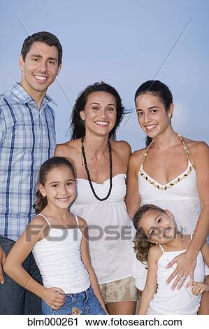 Stock Image - Hispanic family posing. Fotosearch