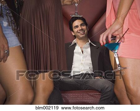 Hispanic man at nightclub View Large Photo Image Stock Photo - Hispanic man at nightclub. Fotosearch