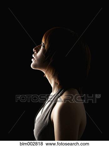 Hispanic woman looking up View Large Photo Image Stock Photo - Hispanic woman looking up. Fotosearch