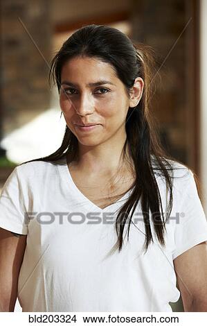 Picture - Hispanic woman smiling. Fotosearch