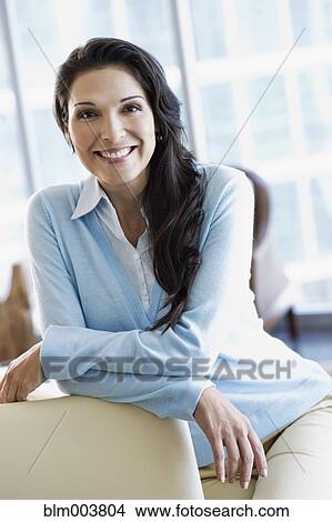 Picture - Hispanic woman smiling. Fotosearch