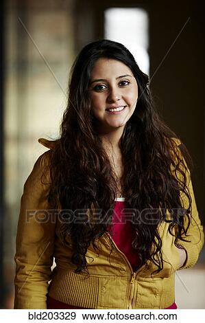 Hispanic woman smiling View Large Photo Image Stock Photo - Hispanic woman smiling. Fotosearch