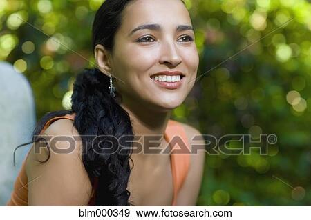 Stock Photo - Hispanic woman smiling. Fotosearch