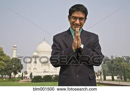 Indian businessman praying at the Taj Mahal View Large Photo Image Stock Image - Indian businessman praying at the Taj Mahal. Fotosearch