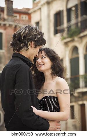 Stock Image - Italian couple hugging. Fotosearch