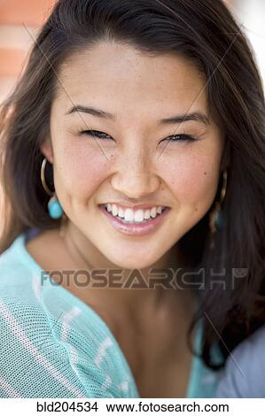 Picture - Japanese woman smiling. Fotosearch