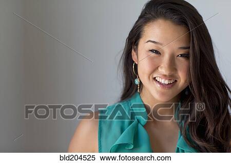 Stock Photography - Japanese woman smiling. Fotosearch