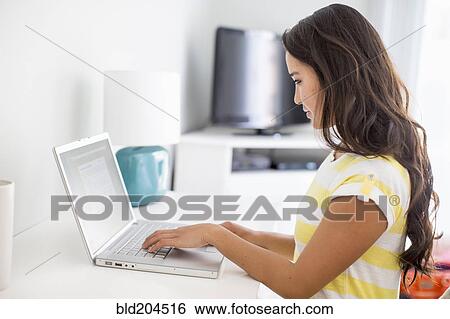 Japanese woman using laptop View Large Photo Image Stock Photograph - Japanese woman using laptop. Fotosearch