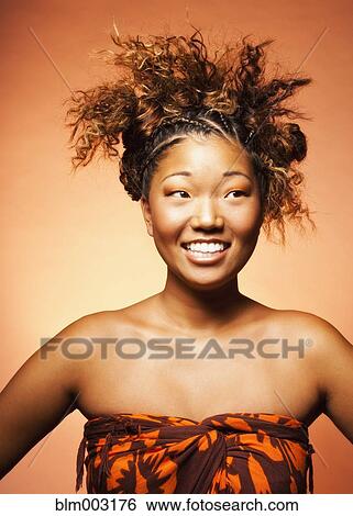 Japanese woman with exotic hairstyle View Large Photo Image Stock Photograph - Japanese woman with exotic hairstyle. Fotosearch