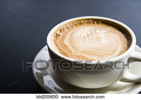 Leaf design in espresso foam View Large Photo Image Stock Image - Leaf design in espresso foam. Fotosearch