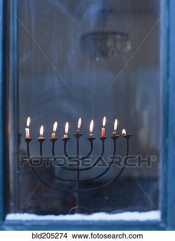 Lit Menorah on Windowsill View Large Photo Image Picture - Lit Menorah on Windowsill. Fotosearch