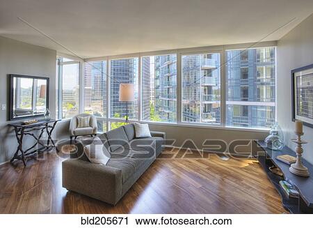 Living room in highrise apartment View Large Photo Image Stock Image - Living room in highrise apartment. Fotosearch