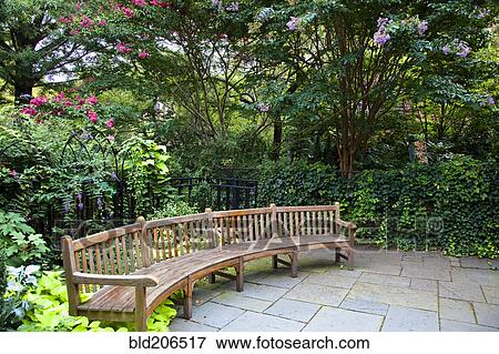 Stock Photo - Long Rounded Park Bench. Fotosearch