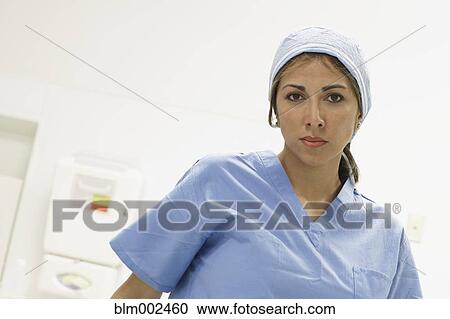 Low angle view of Hispanic female medical professional View Large Photo Image Stock Image - Low angle view of Hispanic female medical professional. Fotosearch