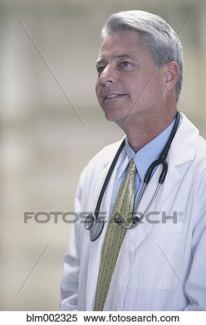 Stock Photography - Male doctor with stethoscope. Fotosearch
