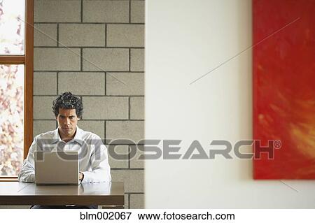 Man typing on laptop View Large Photo Image Stock Photo - Man typing on laptop. Fotosearch