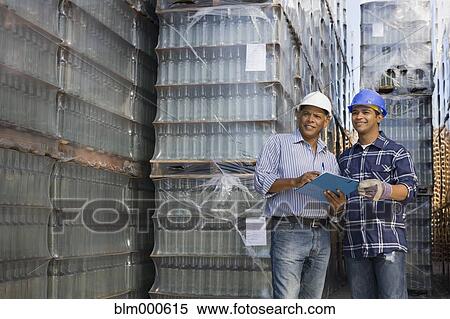 Manager talking with worker at processing plant View Large Photo Image Stock Photography - Manager talking with worker at processing plant. Fotosearch