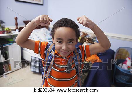 Mixed Race Boy Wearing Backpack In Bedroom Picture Bld203584