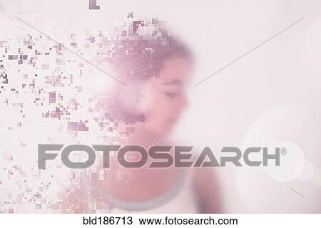 Stock Image - Mixed race girl dissolving into pixels. Fotosearch