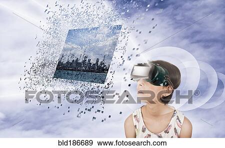 Stock Photo - Mixed race girl watching virtual reality screen. Fotosearch