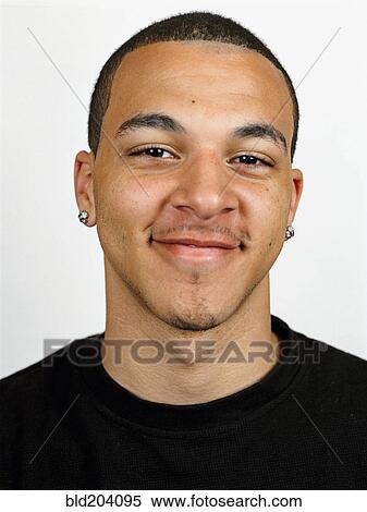 Stock Photography - Mixed race man smiling. Fotosearch