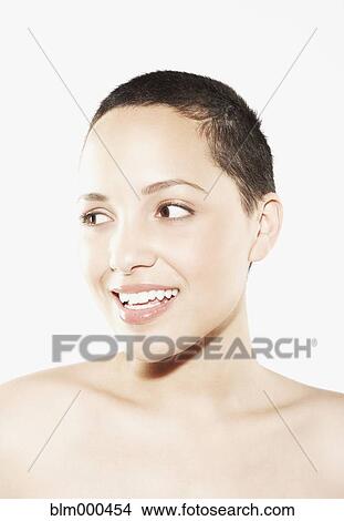 Picture - Mixed race woman smiling. Fotosearch