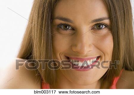 Stock Photo - Mixed race woman smiling. Fotosearch
