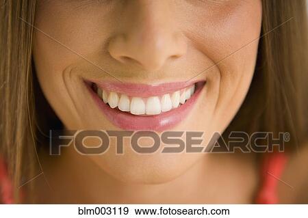 Mixed race woman smiling View Large Photo Image Stock Photo - Mixed race woman smiling. Fotosearch