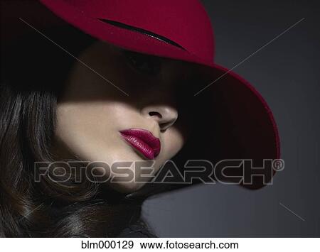 Stock Photo - Mixed Race woman wearing hat. Fotosearch