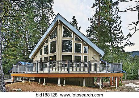 Modern cabin in rural forest View Large Photo Image Stock Photo - Modern cabin in rural forest. Fotosearch