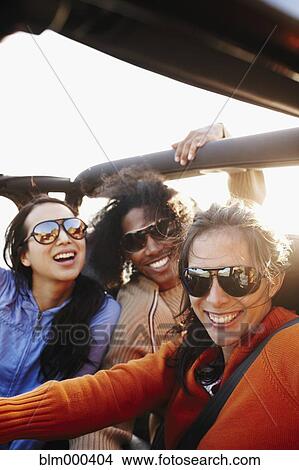 Picture - Multi-ethnic friends on roadtrip. Fotosearch